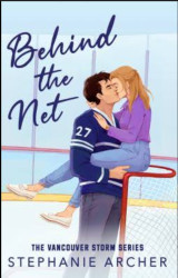 Behind the net